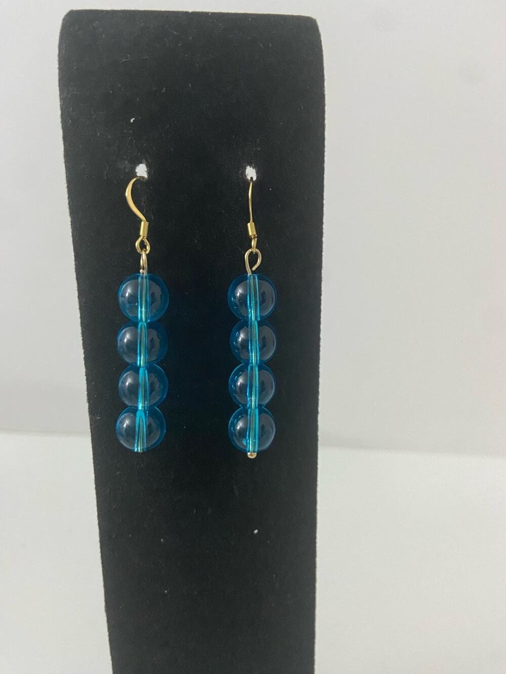 Bright blue glass bead earrings gold tone